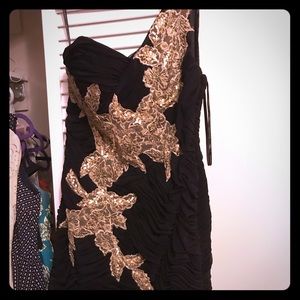 Black dress with gold accents